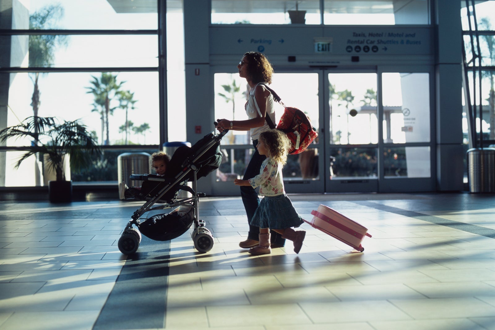 Family Walking through Airport