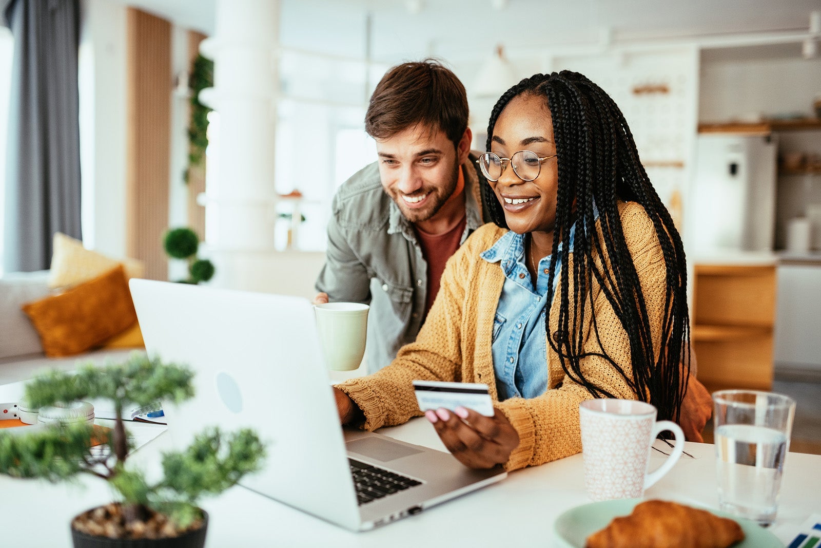 Family using credit card for online payments