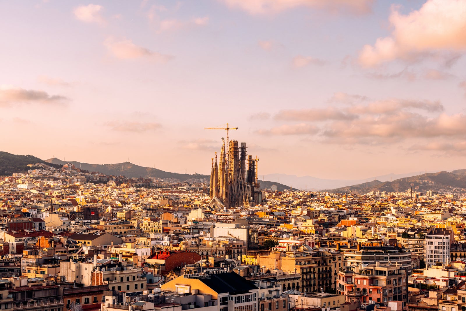 Barcelona cityscape with Sagrada Familia at sunset, aerial view, Catalonia, Spain